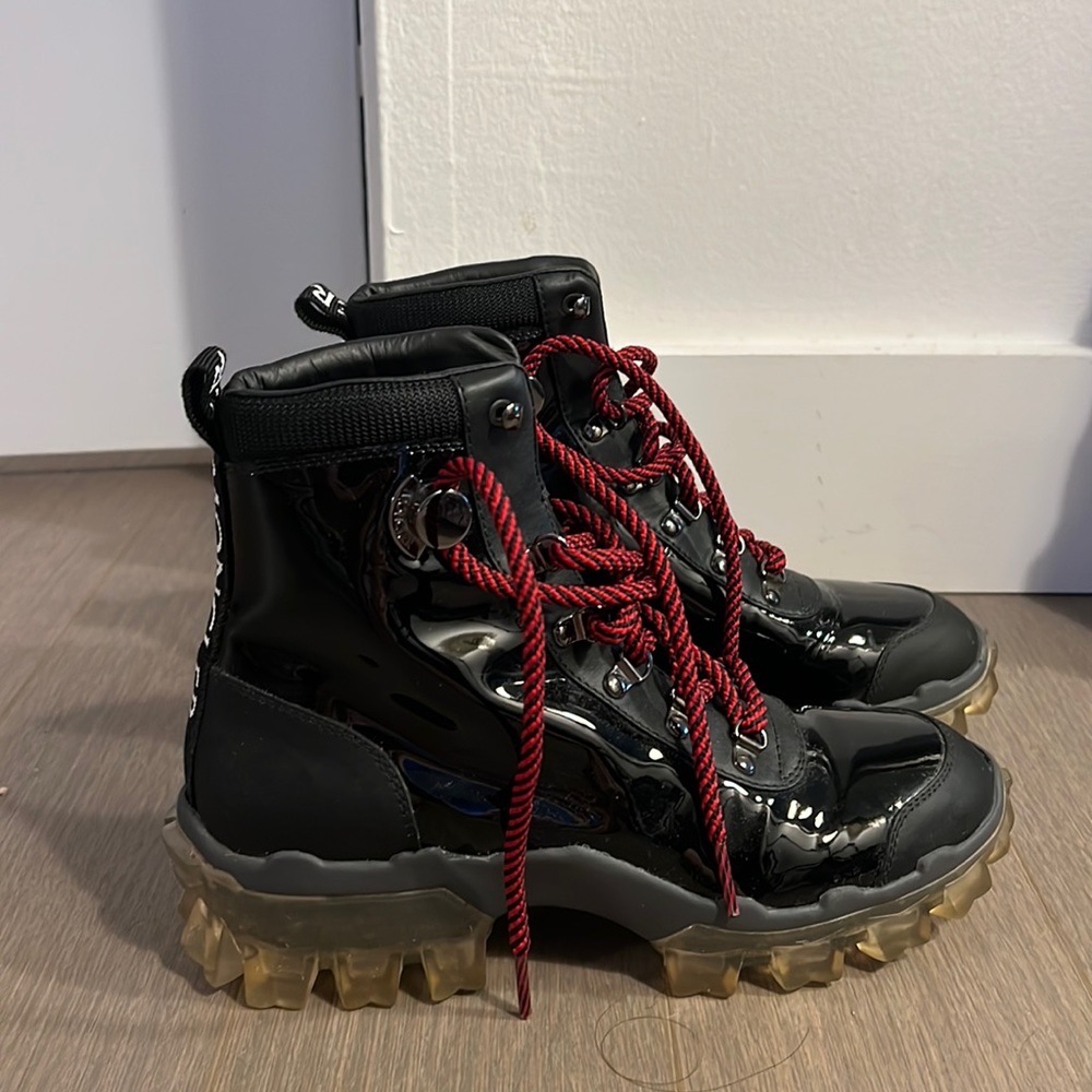 Moncler patent leather combat boots. Clear soles. Red laces.